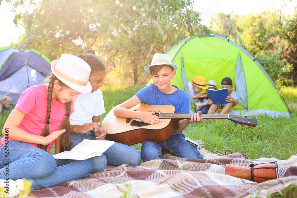 Group of children resting at summer camp