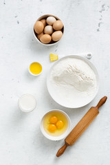 Poster - Dough ingredients on a white background top view