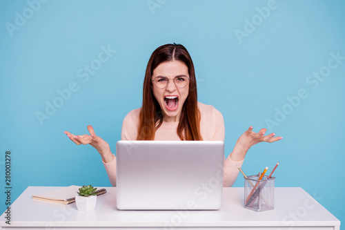 Close up photo beautiful she her lady hands arms raised air foxy head sit desk table notebook office workplace yelling loud loser epic fail wear casual pastel pullover isolated bright blue background