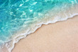 Leinwandbild Motiv Soft blue ocean wave or clear sea on clean sandy beach summer concept