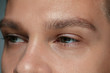 © master1305 - Close-up portrait of young man's face isolated on grey studio background. Caucasian male model looking at side and posing. Concept of men's health and beauty, self-care, body and skin care.