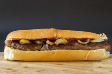 Grilled Sausage On A Roll With Onions And Catchupsouth African Boerewors Roll