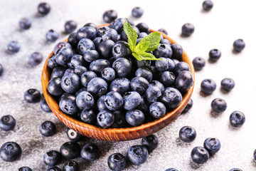 Wall Mural - Perfectly ripe freshly picked local produce blueberries. Close up, copy space for text, top view, background. Healthy vegan snacks full of antioxidants. Seasonal summer berries.