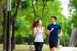 © Tom Wang - happy young Couple jogging and running  in park