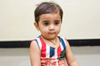 © Neha - cute Indian baby girl playing at home