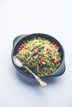 Hariyali Poha / Green Masala Pohe Or Flattened Rice Served In A Bowl, Selective Focus