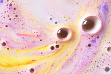 Foam With Round Bubble Of Bath Bomb Close-up Colorful Background