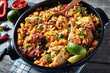 © myviewpoint - close-up of Arroz con pollo in a pan