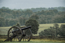 Old Cannon In A Field