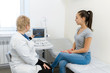 © Kate - Professional doctor advises the patient young girl after ultrasound