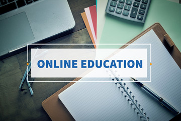 Notebook and Laptop with text ONLINE EDUCATION