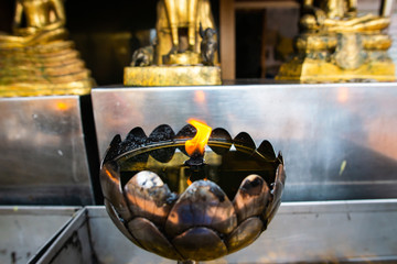 Canvas Print - Oil lamp in the temple