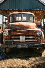 Vintage Old Rusted Pickup Truck With Wooden Back For Farming And Hauling Crops