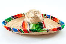 Cinco De Mayo, Traditional Mexican Hat And Caribbean Culture Concept Theme With Close Up On Wicker Or Straw Sombrero Decorated In Bright Colors Isolated On White Background
