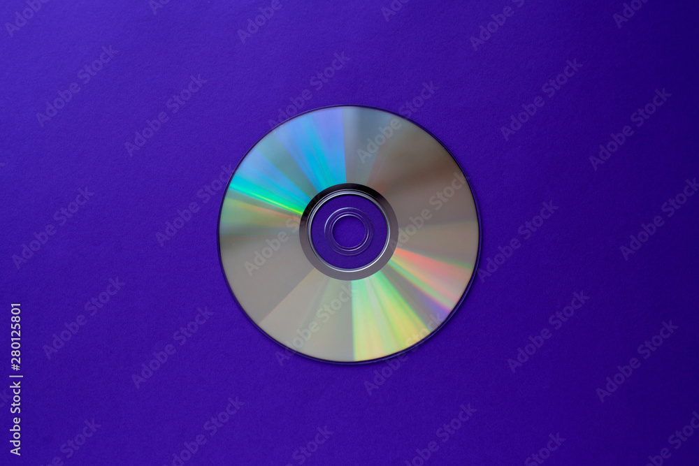 cd compact disc on  a dark blue background top view with copy space  - obrazy, fototapety, plakaty 