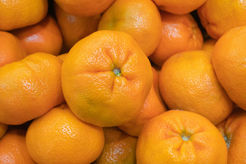 Wall Mural - Closeup of orange In the market, the concept of vitamin C and health