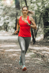 Young Woman Jogging. Park, Nature