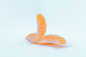 Sweet and delicious orange slices on a white background