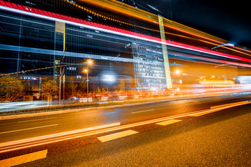 the light trails on the modern building background.