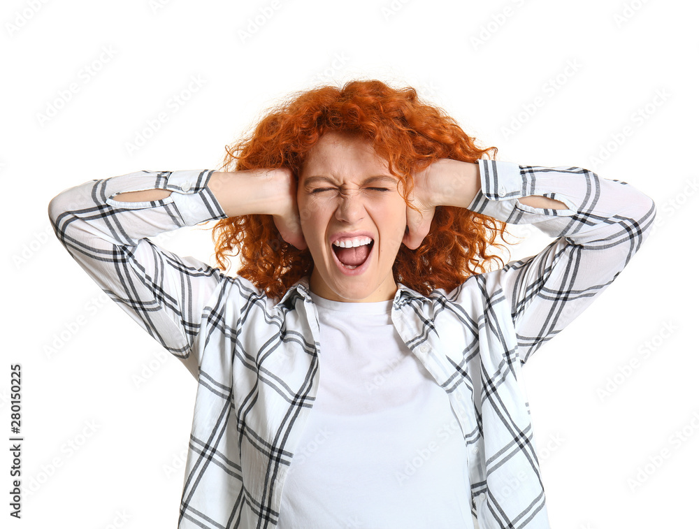Stressed redhead woman on white background