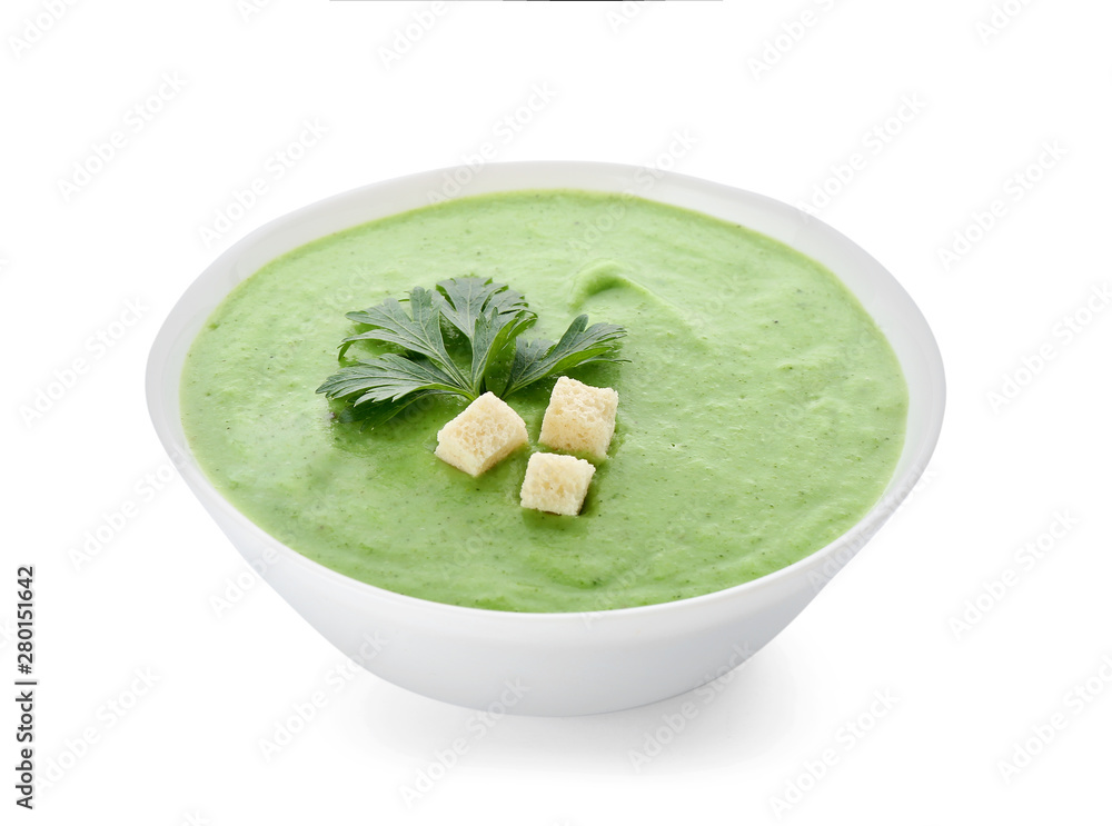 Bowl with delicious cream soup on white background