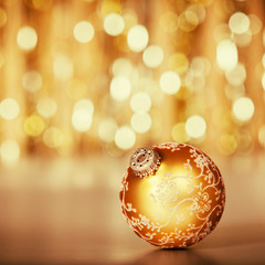 Wall Mural - Christmas decoration on abstract gold background, close up