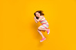 © deagreez - Full size photo of nice sweet girl jumping isolated over yellow background