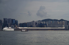 View Of Kai Tak Cruise Terminal With Classic Casino Cruise Ship And Kowloon Bay Skyline In Background