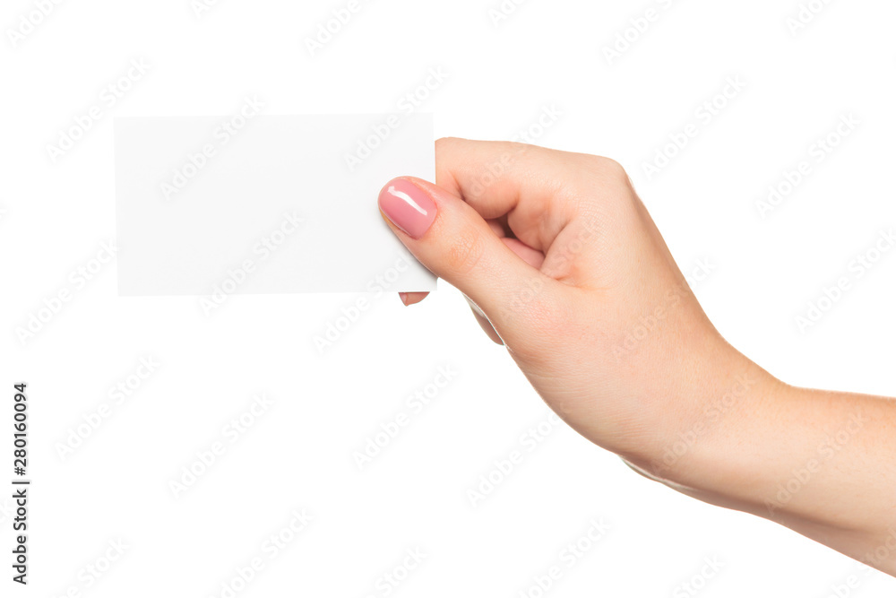 Empty sheet of paper in female hand with manicure isolated on white - obrazy, fototapety, plakaty 
