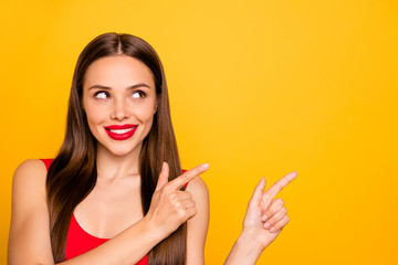 Photo of beautiful lady bright lipstick nice indicate fingers empty space advising cool offer price wear red swimming suit isolated yellow background