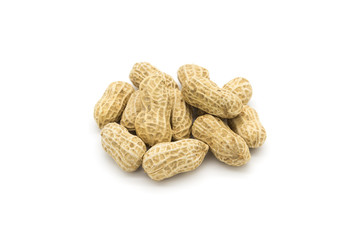 Wall Mural - Stacked fresh shelled peanuts close-up on a white background