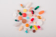© Oleksandr Kozak - High number of pills on white background surface. High resolution image for pharmaceutical industry.