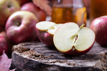 Wall Mural - Apple Sliced in Half On Old Wooden Surface