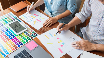 business technology concept, creative team designer choosing samples with ui/ux developing on sketch