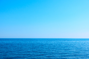 Wall Mural - seascape with sea horizon and clear blue sky