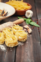 Wall Mural - Tasty Fresh Colorful Ingredients for Cooking Pasta Tagliatelle