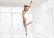 © Prostock-studio - Young Lady Dancing Classic And Modern Ballet In Spacious Studio
