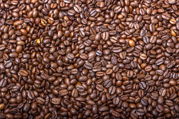 Background of roasted, fragrant coffee beans.