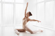 © Prostock-studio - Graceful Ballet Girl Posing In Modern Dance Studio