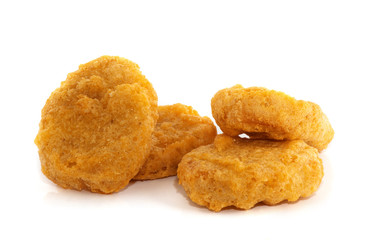 Wall Mural - Fried chicken nuggets isolated on white