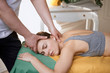 © Cavan Images - masseur works. man makes a beautiful woman massage
