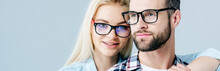 Panoramic Shot Of Man And Beautiful Girl In Glasses Isolated On Grey