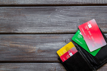 business with credit cards and wallet on office desk wooden background top view mock up