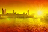 Fototapeta Londyn - big ben against orange sunny background - heat wave in the UK