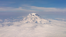 Mount Rainier With Clouds From Airplane View