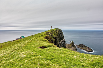 Mykines island lighthouse long exposure in Faroe islands