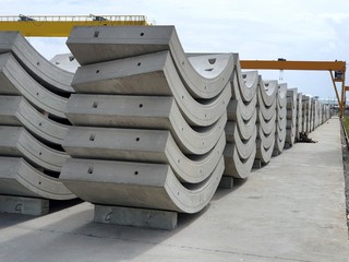 Precast concrete plant with blue sky in the construction site, in storage yard area at Thailand, Space for text in template, Concrete Tunnel Segments