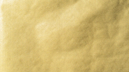 Gold texture background metallic golden foil or shinny wrapping paper bright yellow wall paper for design decoration element