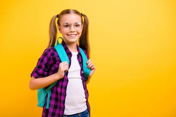 Canvas Print - Closeup photo of little lady return classroom wear specs new bag checkered shirt jeans denim isolated yellow background