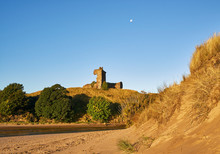 The Early Morning Golden Light Sets Off The Red Sandstone Castle Walls Of The Red Castle Near Lunan Bay, Inverkeilor, Scotland.